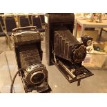 Two folding Kodak Bellows cameras with cases