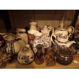 Shelf of mixed household ceramics
