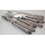 Six knives and three forks with hallmarked silver handles