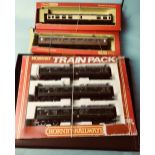 Three boxed Triang and Hornby 3 car diesel unit and coaches