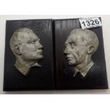 Cast aluminium busts of Goering and Goebbels mounted on wooden plaques