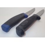 Two fishing knives in plastic sheaths including Frosts of Sweden