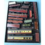 Eighteen assorted Hornby and Dublo tin plate coaches and wagons