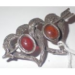 Silver hearts entwined stone set brooch