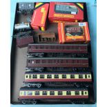 Eleven Hornby OO and Triang coaches and wagons