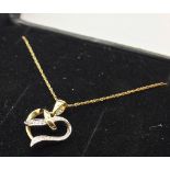 9ct yellow and white gold diamond set heart pendant on 9ct gold necklace