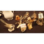 Group of ceramic bird figurines including Goebel and Beswick
