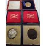 Two silver and one bronze boxed George V Coronation medals