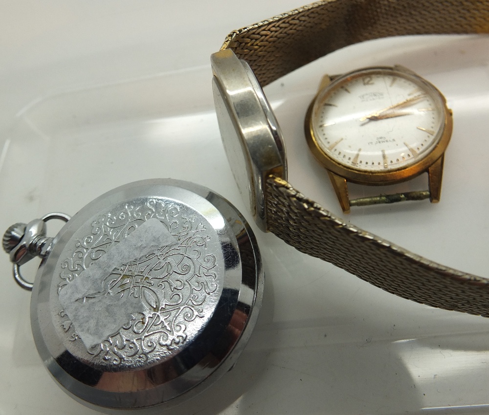 Two wristwatches and a stainless steel pocket watch