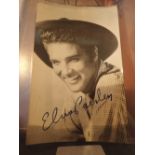 Two Elvis Presley postcards with printed signatures
