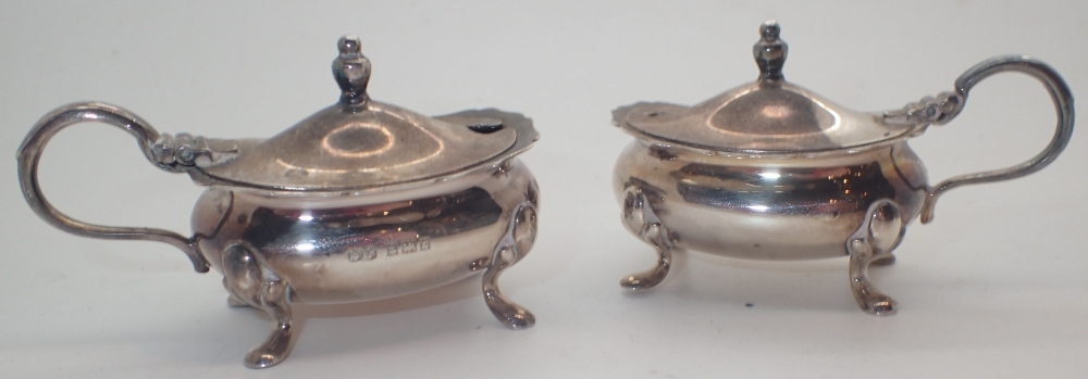 Pair of hallmarked silver lidded mustard pots by William Suckling Ltd assay Birmingham 1900 106g