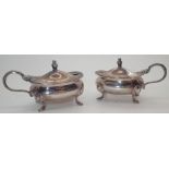 Pair of hallmarked silver lidded mustard pots by William Suckling Ltd assay Birmingham 1900 106g