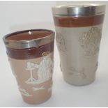 Two Royal Doulton Lambeth harvest beakers one silver plated rim other hallmarked silver largest H: