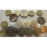 Fourteen old pound coins and three fifty pence pieces