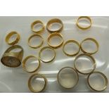 Box of fifteen yellow metal rings mixed sizes