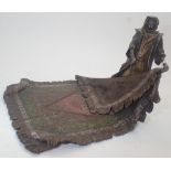 Signed Bergman Austrian cold painted bronze of an Arab man displaying a carpet 22 x 15 cm