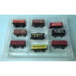 Nine assorted Hornby Lima and Bachmann plank wagons