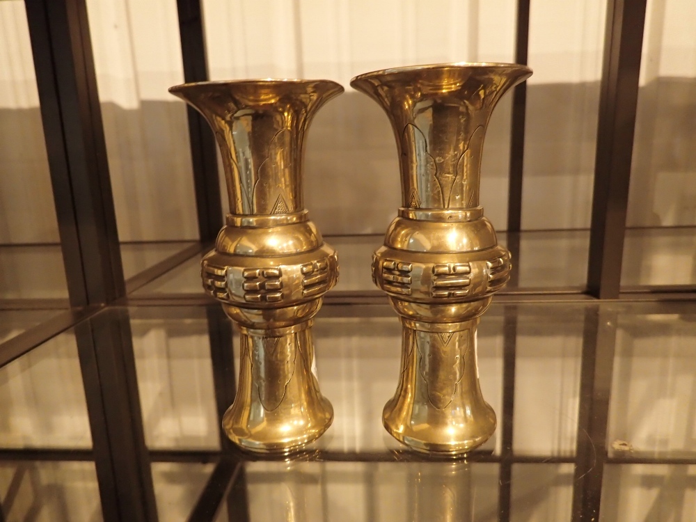 Pair of heavy brass Oriental vases H: 18 cm
