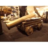 Vintage brass desk cannon with wooden carriage