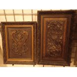 Two hand carved oak armorial panels