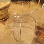 Glass and steel circular dining table