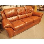 Good quality brown leather three seater settee
