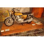 Well built Tamiya 1/6th Honda CB750 KI on a wooden plinth