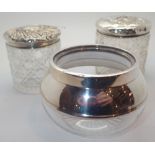 Three silver topped cut glass dressing table items two with lids