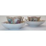 Pair of continental miniature cabinet cups and saucers with crossed swords backstamps