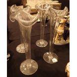 Four blown glass trumpet vases with unpolished pontils H: 40 cm