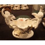 Moores Brothers bowl supported by cherubs H: 24 cm L: 27 cm CONDITION REPORT: Loss