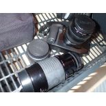 Canon EOS 605 camera with Canon 35-70 zoom lens and a Sigma 75-300 zoom lens and a Canon converter