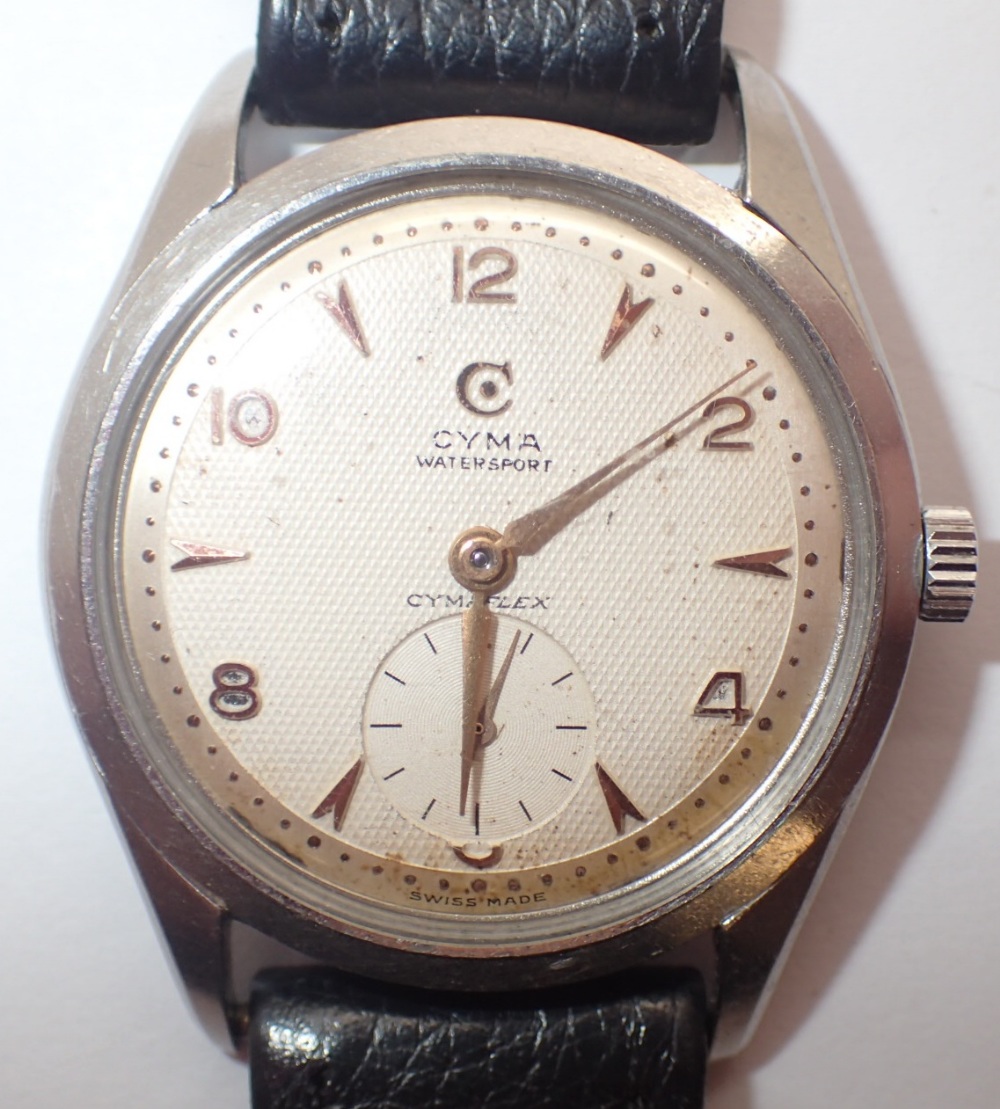 Gents Cyma wristwatch on a leather strap CONDITION REPORT: Working at lotting up