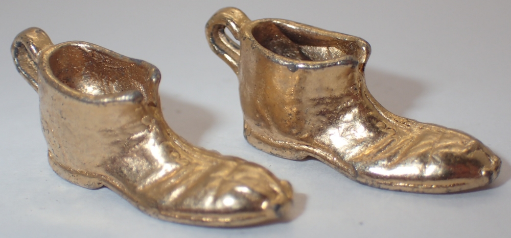 Two presumed 9ct gold boot charms 9.