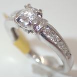 9ct white gold diamond solitaire ring with diamond set shoulders RRP £700 size J/K