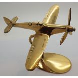 Polished brass spitfire on stand H: 10 cm