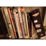 Shelf of motorcycle books including Pictorial History of Japanese Motorcycles