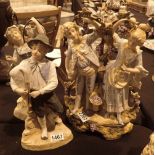 Three German bisque figurines H: 37 cm CONDITION REPORT: The boy has lost the