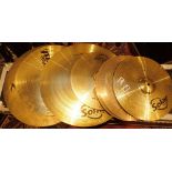 Seven large cymbals of various sizes and manufacturers