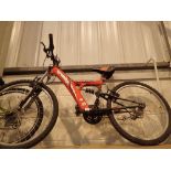 Granite Stealth boys red mountain bike front and rear suspension