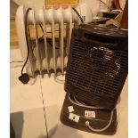 Small oil filled storage radiator and a fan heater
