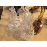 Selection of glass decanters vases etc