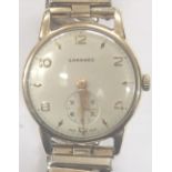 Garrard 9ct gold gents wristwatch on expanding bracelet CONDITION REPORT: This item