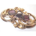 Pinchbeck ladies brooch with three amethyst L: 65 mm