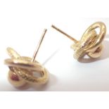 Pair of 18ct yellow gold knot earrings 3.