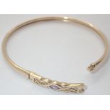 9ct gold amethyst set Celtic bangle