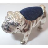 Silver pin cushion in the form of a bulldog