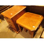 Mahogany table with two under tables and a chest of three drawers