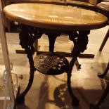 Cast iron three legged circular pub table with undershelf and wooden top D: 60 cm