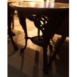 Cast iron three legged circular pub table with undershelf and wooden top D: 70 cm